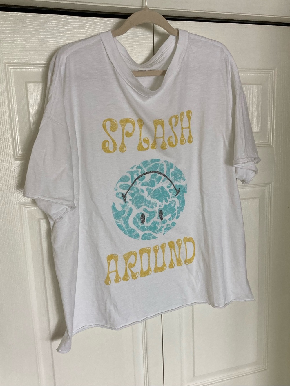 White  oversized Tee with Smiley splash around graphic